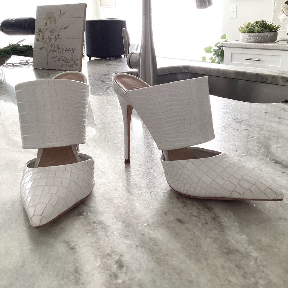 Gorgeous white embossed Schutz high heel mules.